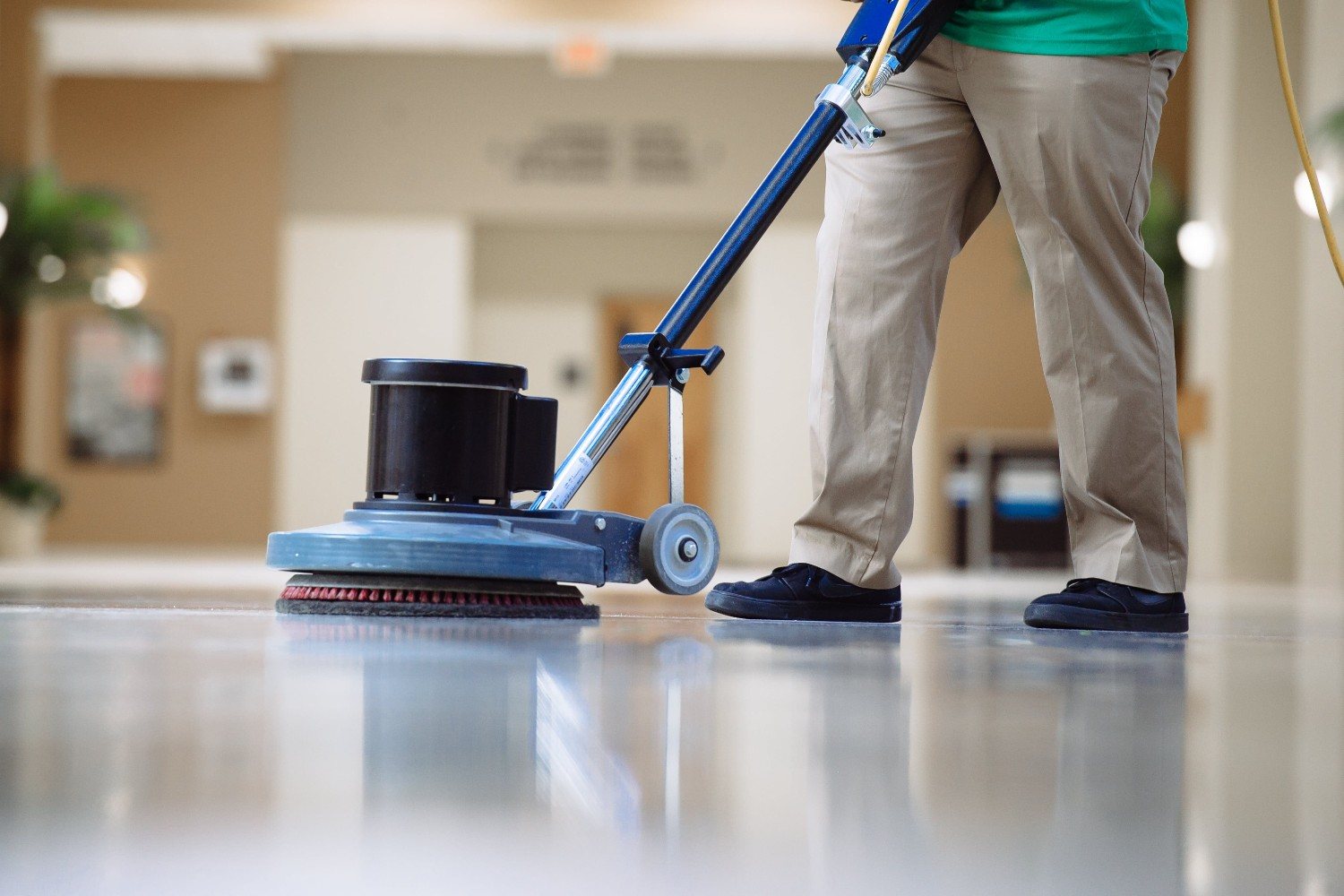 Commercial office cleaning team at work